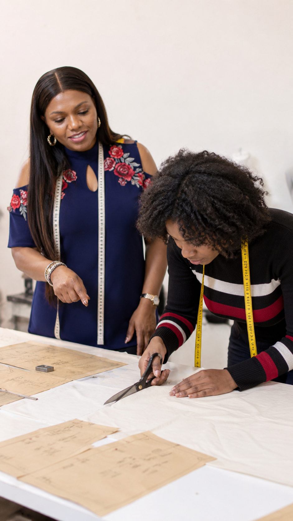 Treasure guiding a student through pattern cutting